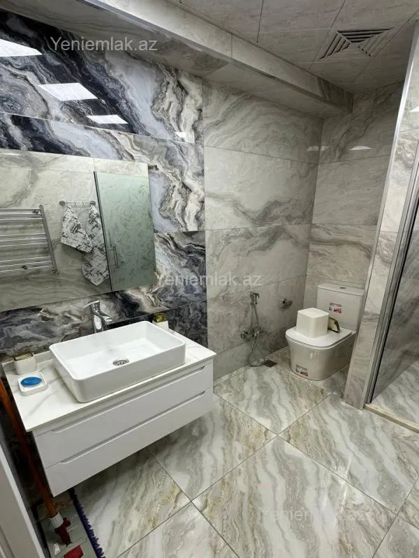 Satılır 2 otaqlı yeni tikili 95 m²