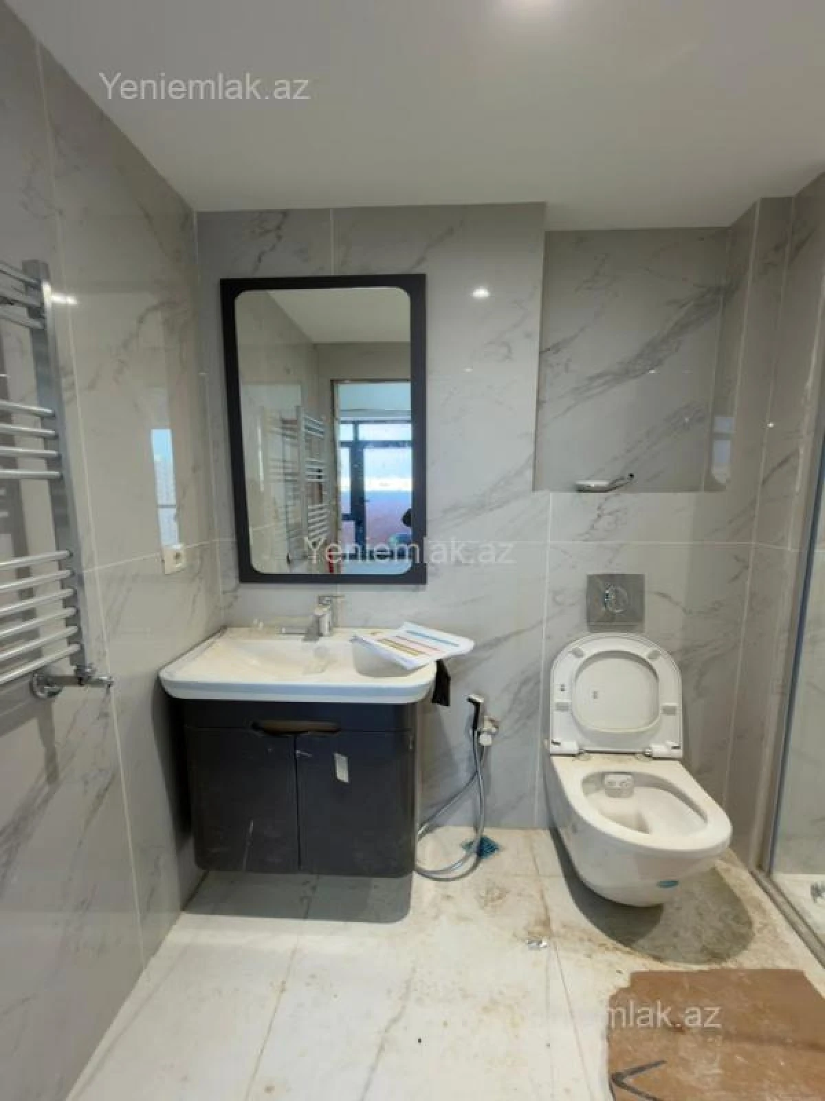 Satılır 3 otaqlı yeni tikili 90.9 m²