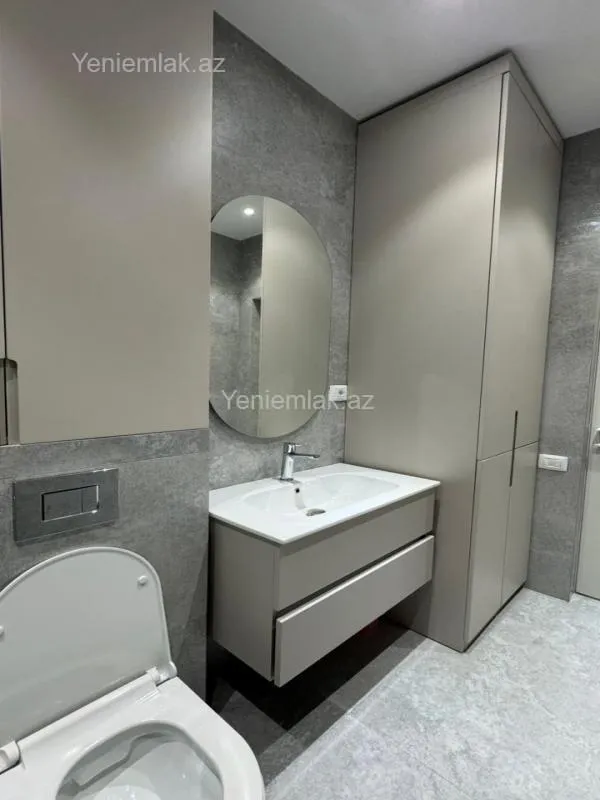 Satılır 2 otaqlı yeni tikili 72.1 m²