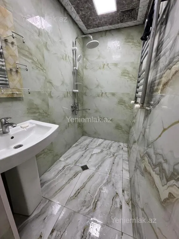 Satılır 3 otaqlı yeni tikili 128 m²