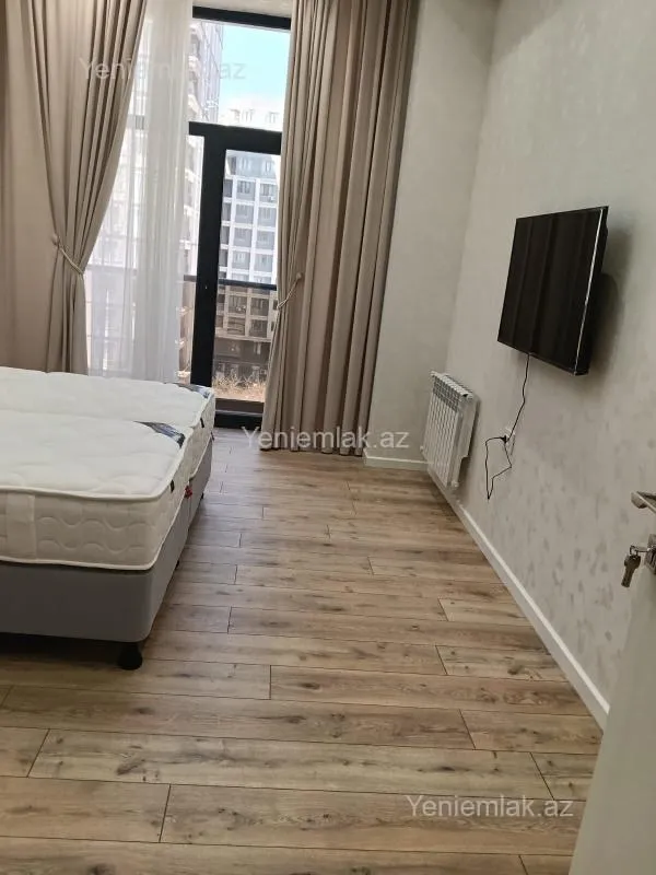 Satılır 2 otaqlı yeni tikili 91 m²