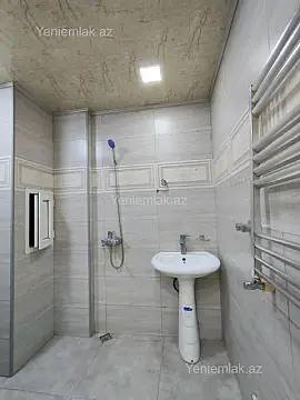 Satılır 2 otaqlı yeni tikili 60 m²