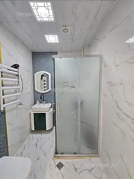 Satılır 2 otaqlı yeni tikili 55 m²