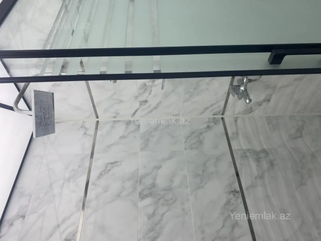 Satılır 2 otaqlı yeni tikili 55 m²