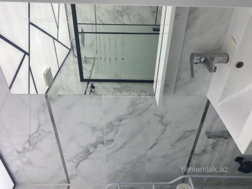 Satılır 2 otaqlı yeni tikili 55 m²