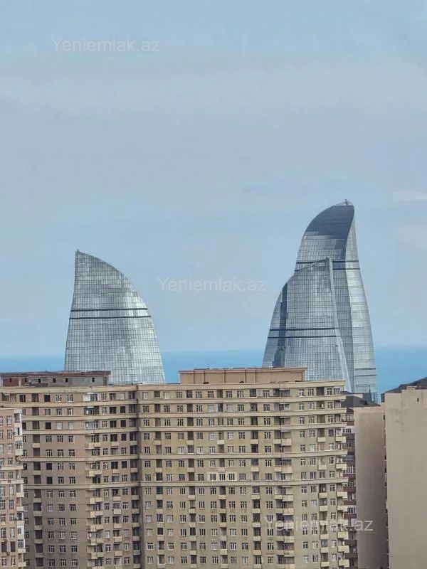 Satılır 2 otaqlı yeni tikili 60 m²