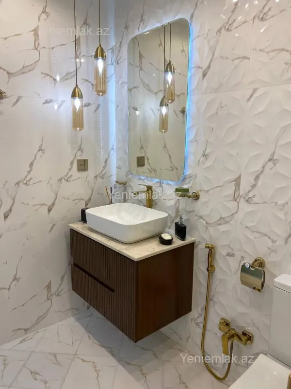 Satılır 3 otaqlı yeni tikili 115 m²