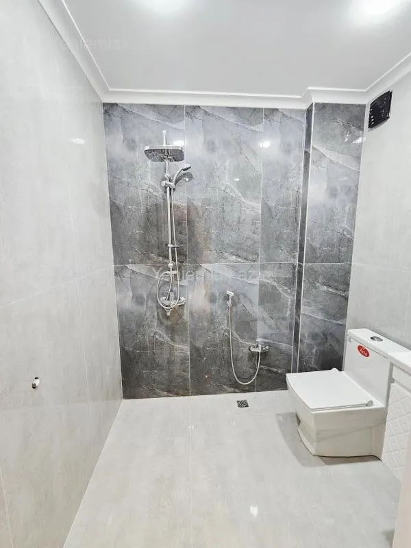 Satılır 2 otaqlı yeni tikili 55 m²