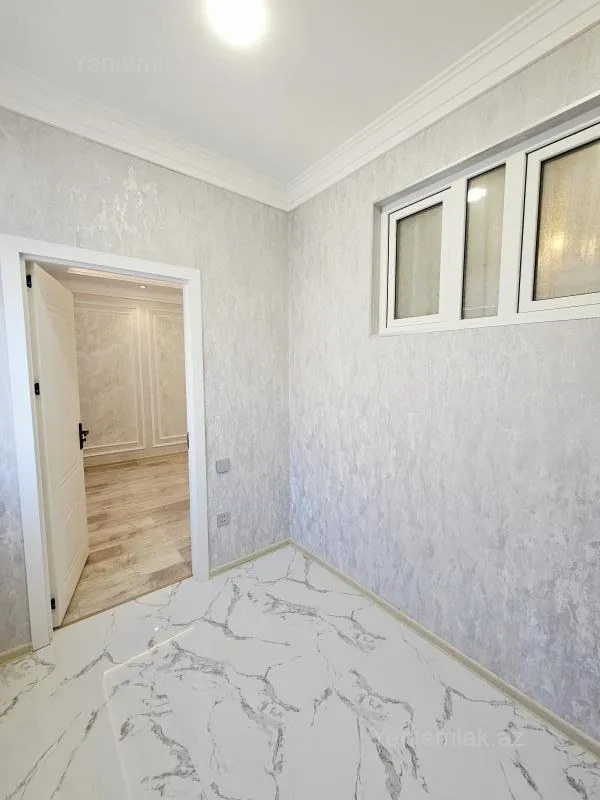 Satılır 2 otaqlı yeni tikili 55 m²