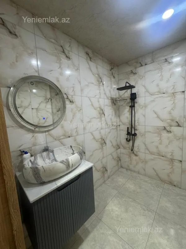 Satılır 2 otaqlı yeni tikili 60 m²