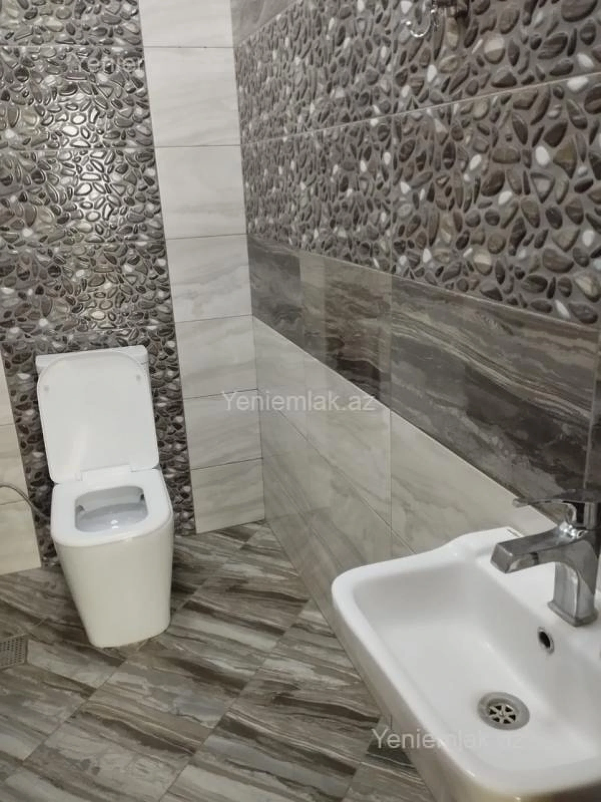 Satılır 3 otaqlı yeni tikili 118 m²