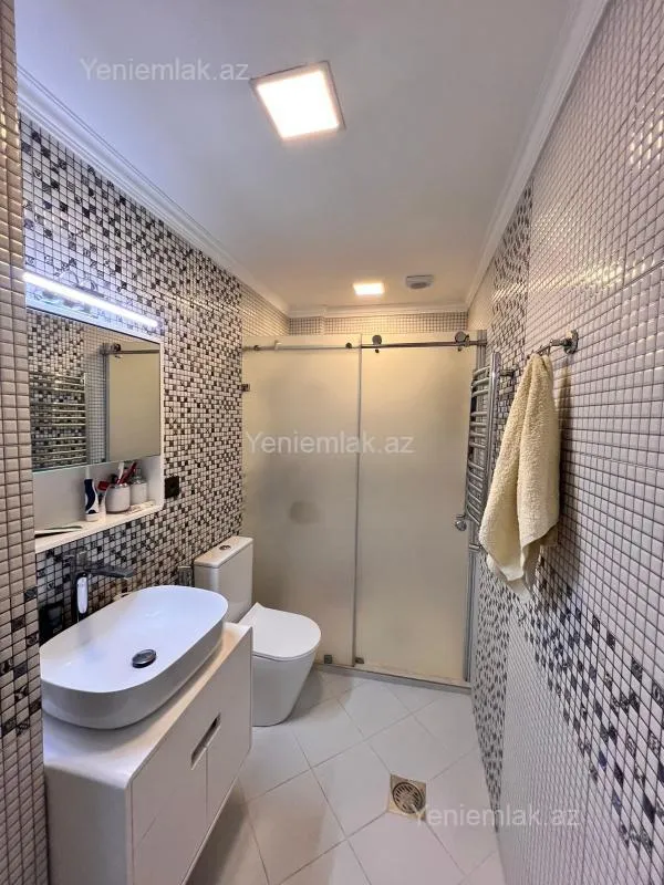 Satılır 2 otaqlı yeni tikili 95.5 m²