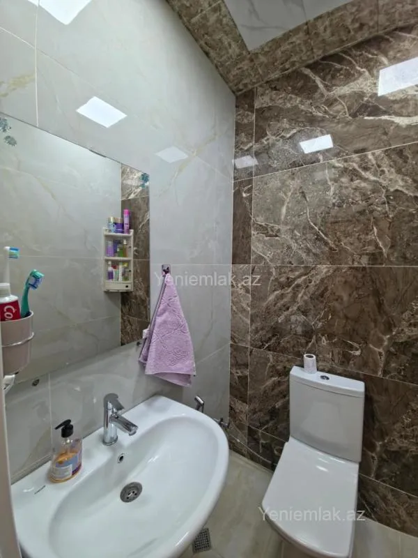 Satılır 3 otaqlı yeni tikili 100 m²