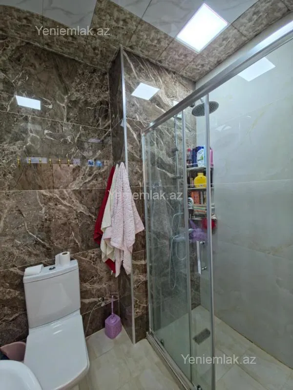 Satılır 3 otaqlı yeni tikili 100 m²