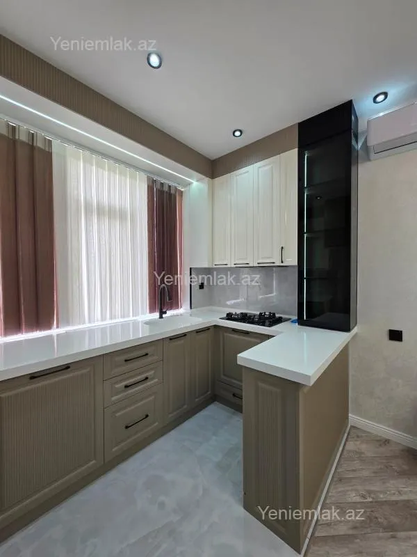 Satılır 2 otaqlı yeni tikili 55 m²