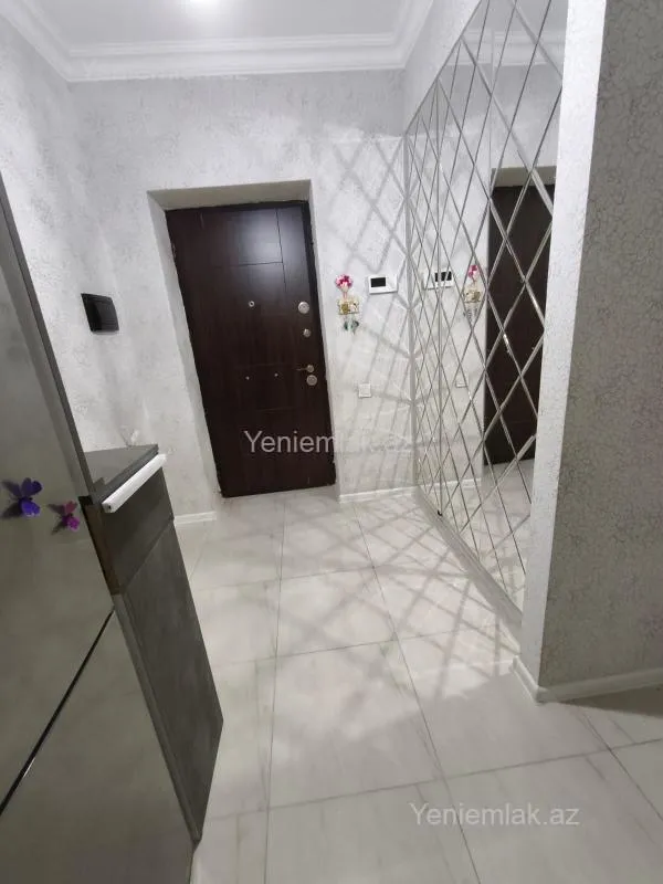 Satılır 2 otaqlı yeni tikili 55 m²