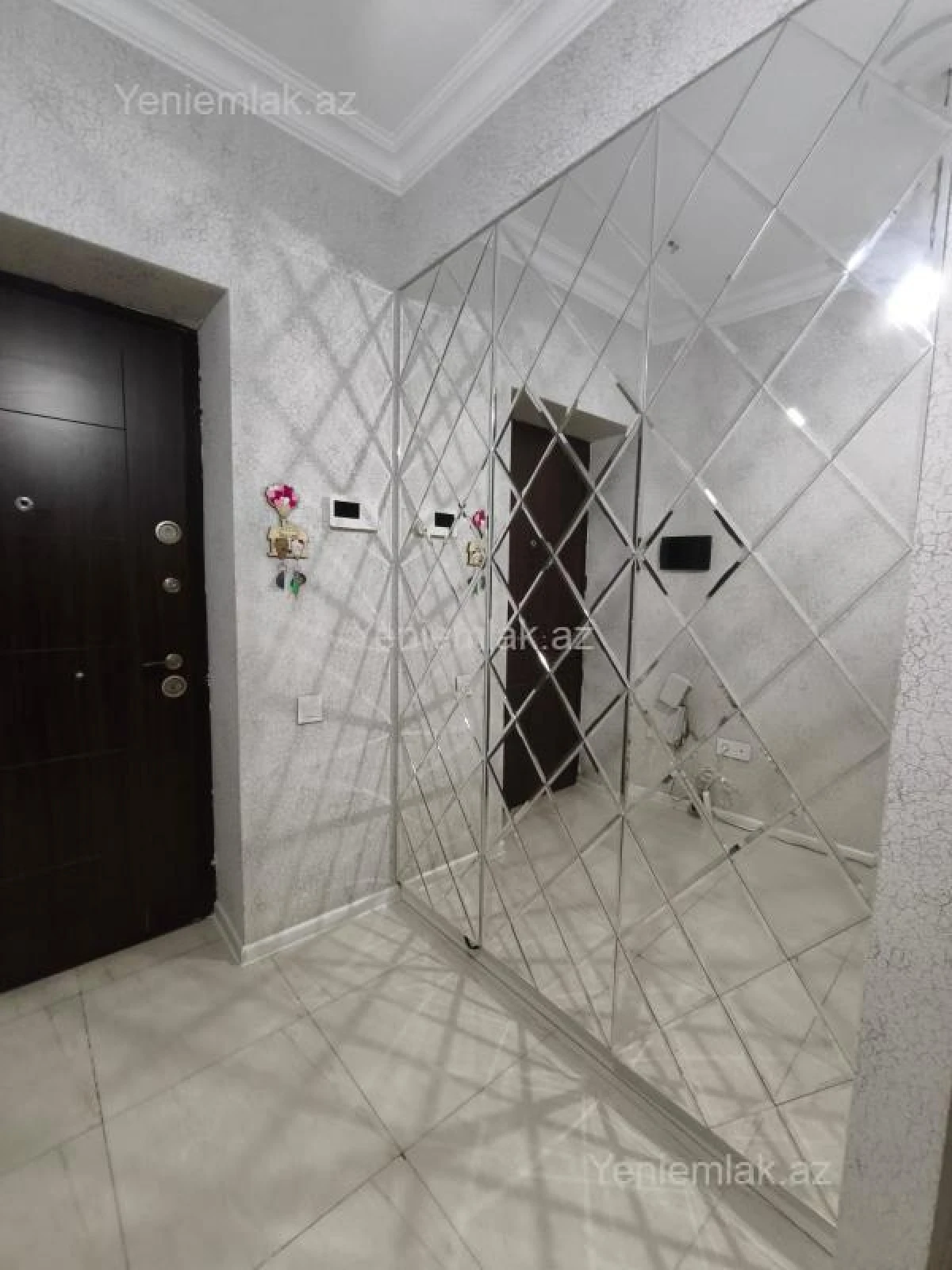 Satılır 2 otaqlı yeni tikili 55 m²