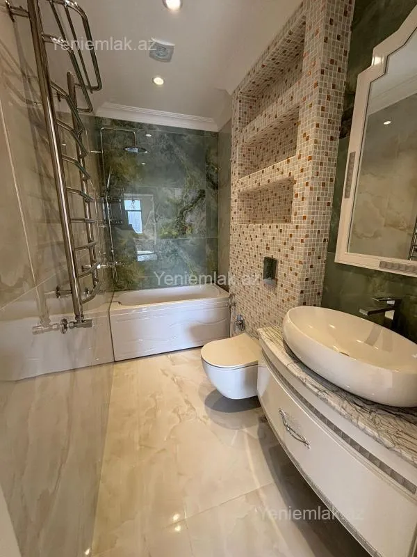 Satılır 4 otaqlı yeni tikili 242 m²