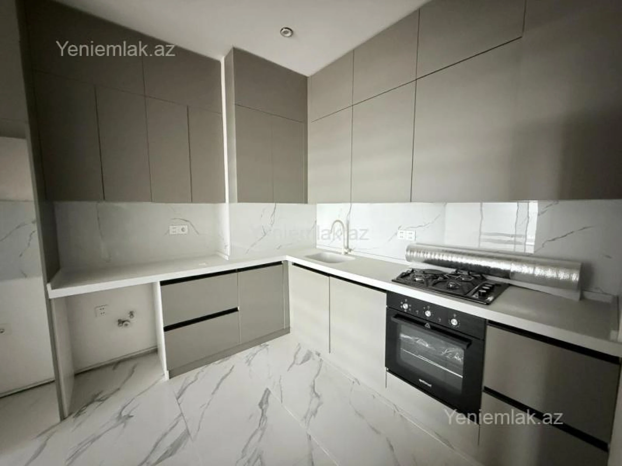 Satılır 2 otaqlı yeni tikili 74.4 m²