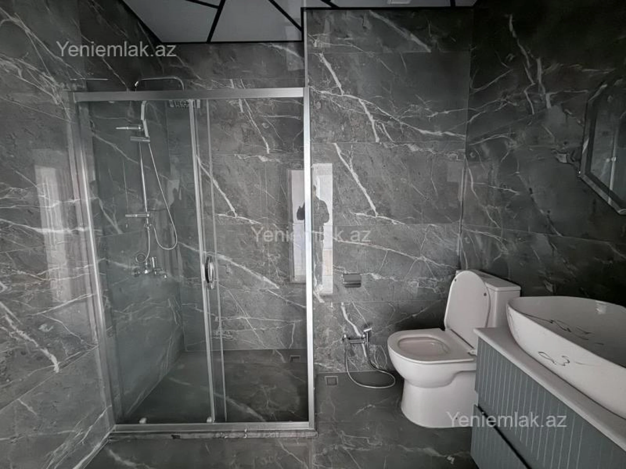 Satılır 2 otaqlı yeni tikili 74.4 m²