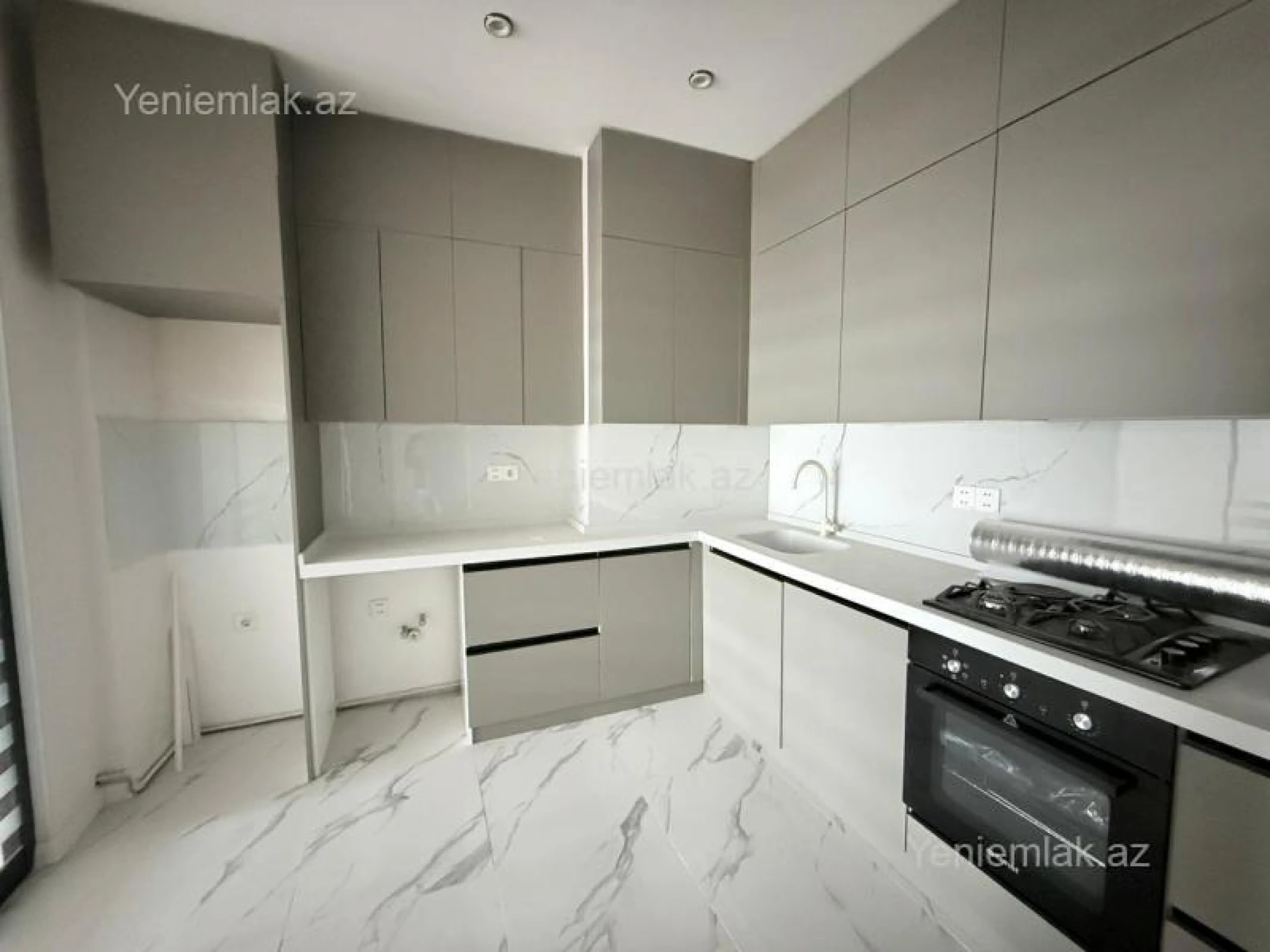 Satılır 2 otaqlı yeni tikili 74.4 m²