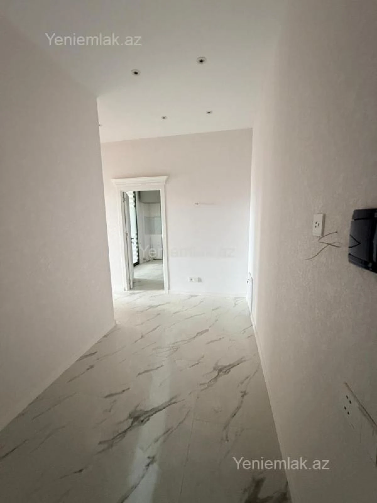 Satılır 2 otaqlı yeni tikili 74.4 m²