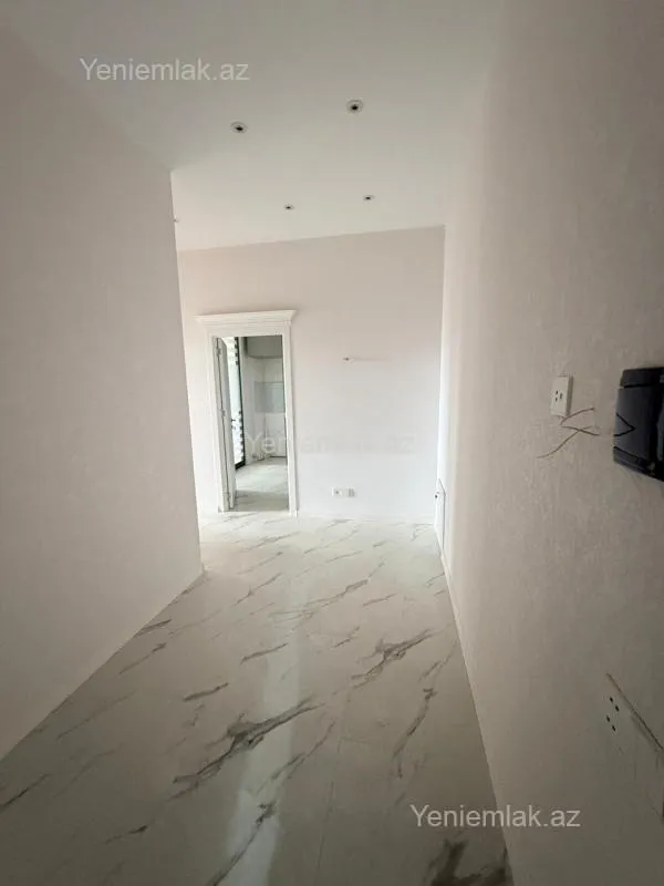 Satılır 2 otaqlı yeni tikili 74.4 m²