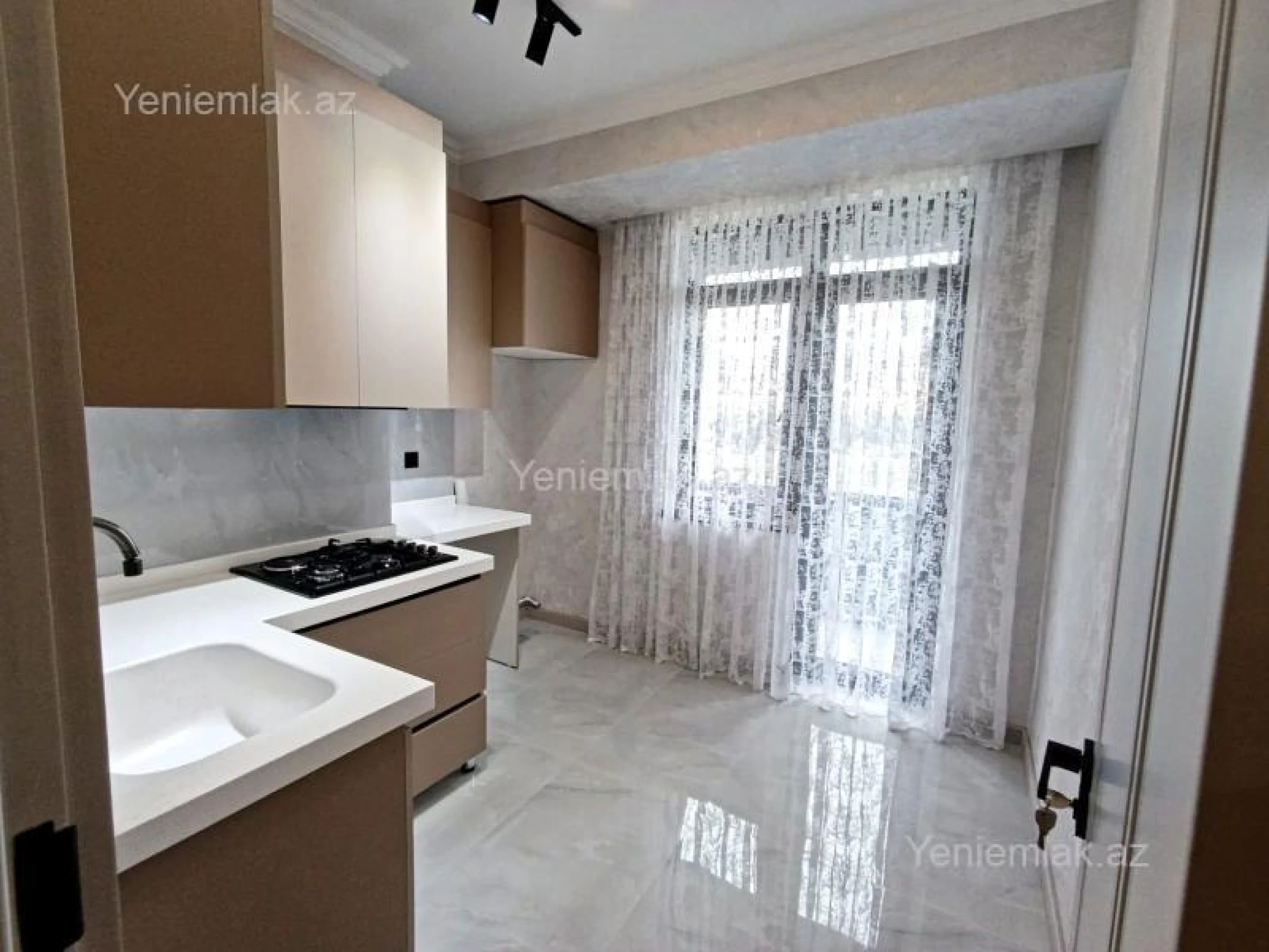 Satılır 2 otaqlı yeni tikili 63 m²