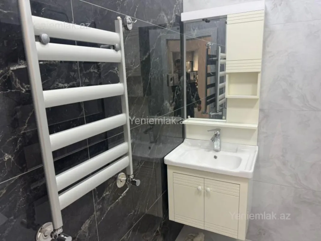 Satılır 2 otaqlı yeni tikili 61.5 m²