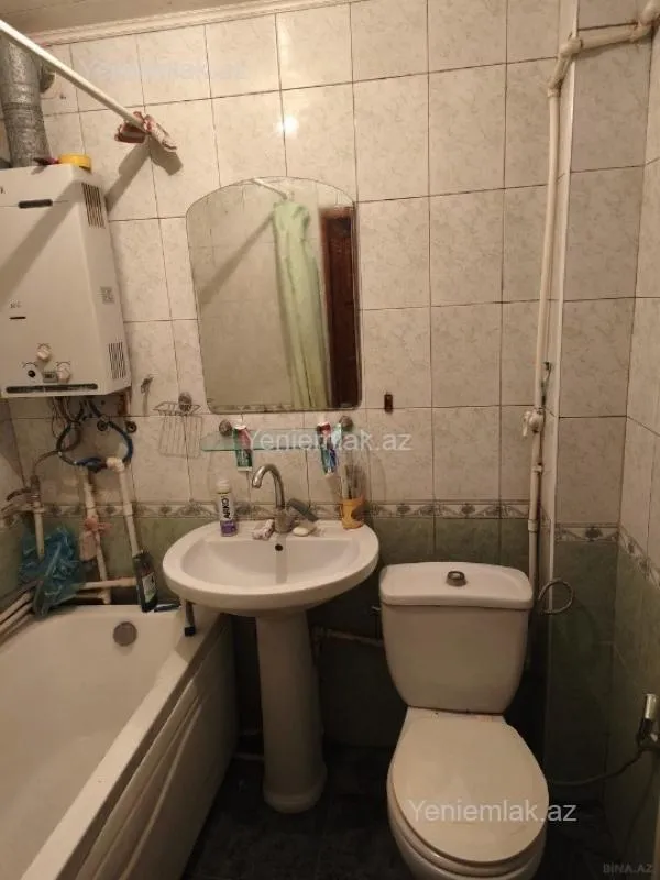 Satılır 2 otaqlı köhnə tikili 55 m²