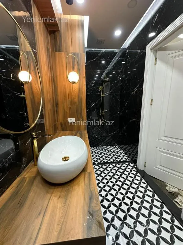 Satılır 3 otaqlı yeni tikili 90 m²