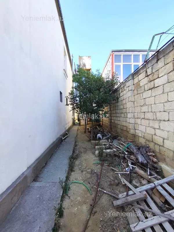 Satılır 9 otaqlı həyət evi 390 m²