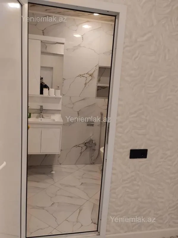 Satılır 2 otaqlı yeni tikili 54 m²