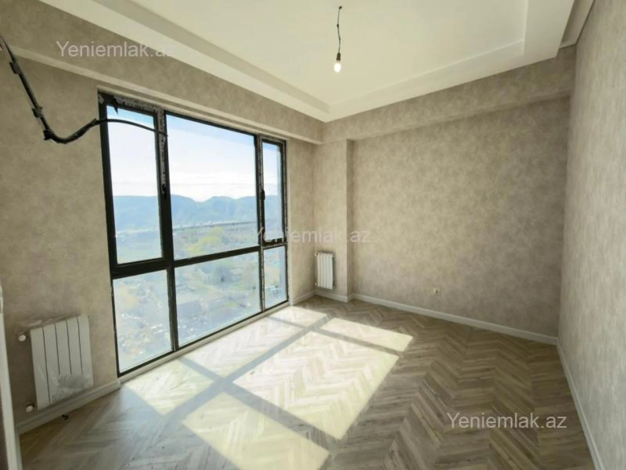 Satılır 2 otaqlı yeni tikili 64 m²