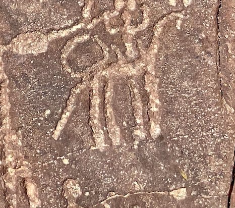 Close-up of a carved rider with shield and spear
