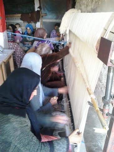 The women recorded that it took a total of 280 hours of weaving time to complete their Beni Ourain rug.