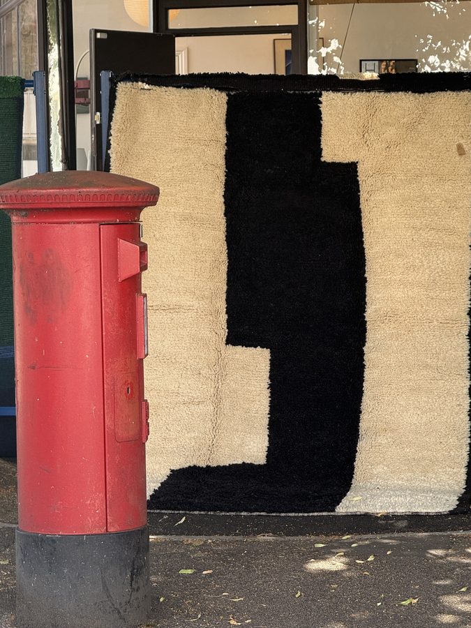 The Creek rug beside a London postbox