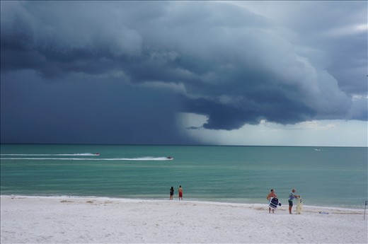 At the beach, you can watch summer storms cross the island and people take cover