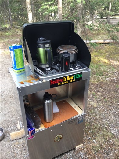 Camp stove and stand in action at Lake Louise campground