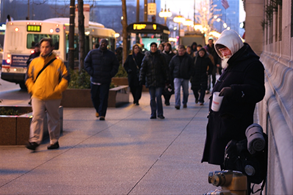 The air grows colder as the day draws to a close. The five o’clock crowd rushes home past an old man. He stands hour after hour; hoping that enough money will be given to him to sustain life for one more day. But passers-by have become desensitized to the plight of the homeless, leaving him with nothing but an empty cup and a frozen face.