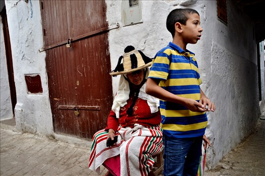 Family in the Medina: mother and son in a street of Tetouan's Medina