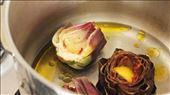 Artichokes trimmed and placed in a pot of lemon juice, olive oil, salt and water.: by _fiosh_, Views[617]