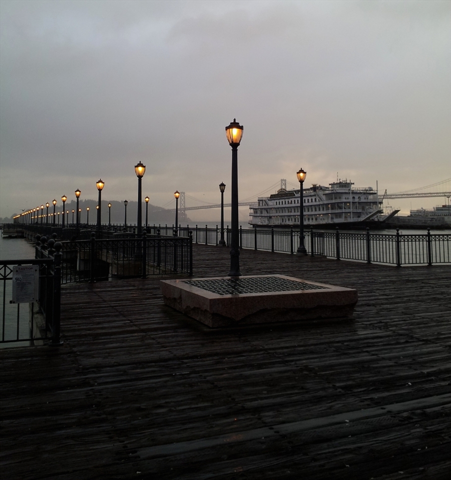 The San Francisco Belle, a 292-foot sternwheeler, rests quietly in the morning fog. During the evening her lights will reflect on the water, drawing photographers to the end of the pier, eager to capture her beauty. 

(Taken with smartphone)