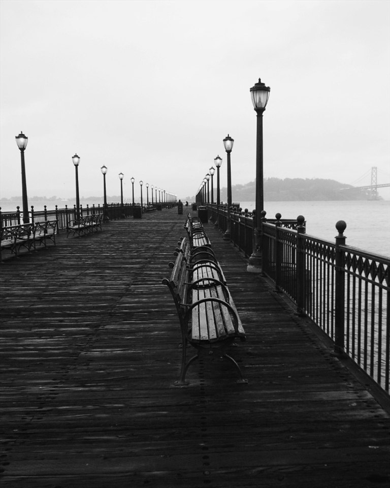 Pier 7 is almost constantly empty in the mornings, especially during cold and foggy mornings. This makes it a wonderful place to forget reality and become engulfed in the sound of waves and the occasional seagull flying overhead. 

(Taken with smartphone)