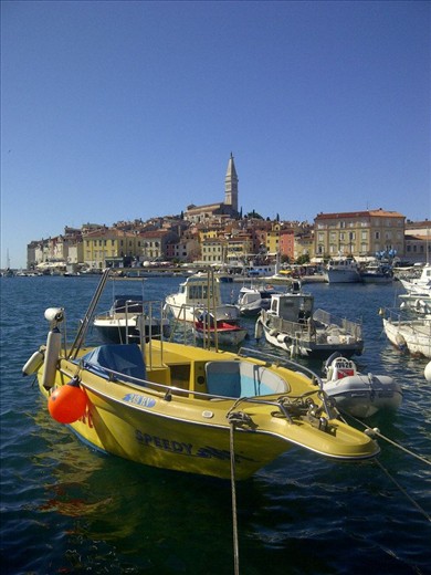 Old town, Rovinj. Rovinians say that all ways lead to Saint Euphrasia Church. I used my view on the church, old town and marina to say that with a  photo.