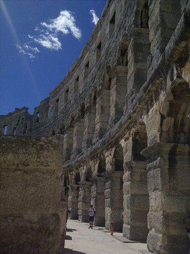 Pula amphitheater.One feels very small when standing next to a building as monumental and old as the amphiteathar in Pula.