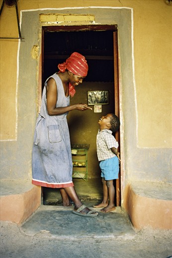 Cheekily being told off