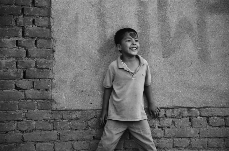 Young boy playing with friends