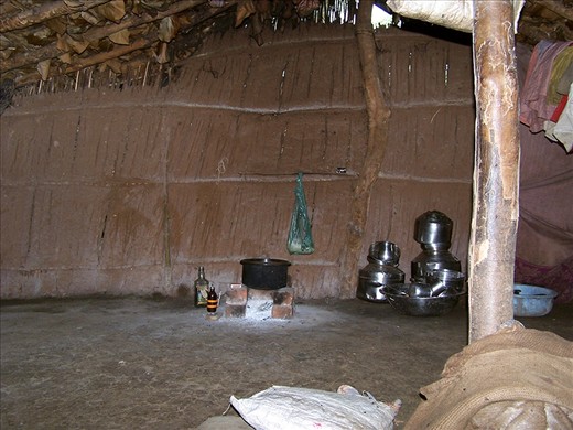 All-In-One, Bedroom, Hall, Study and Kitchen. Stove made of few bricks, Kerosene in bottle, makeshift lamp and one Kg of rice in plastic bag for the Family of four.