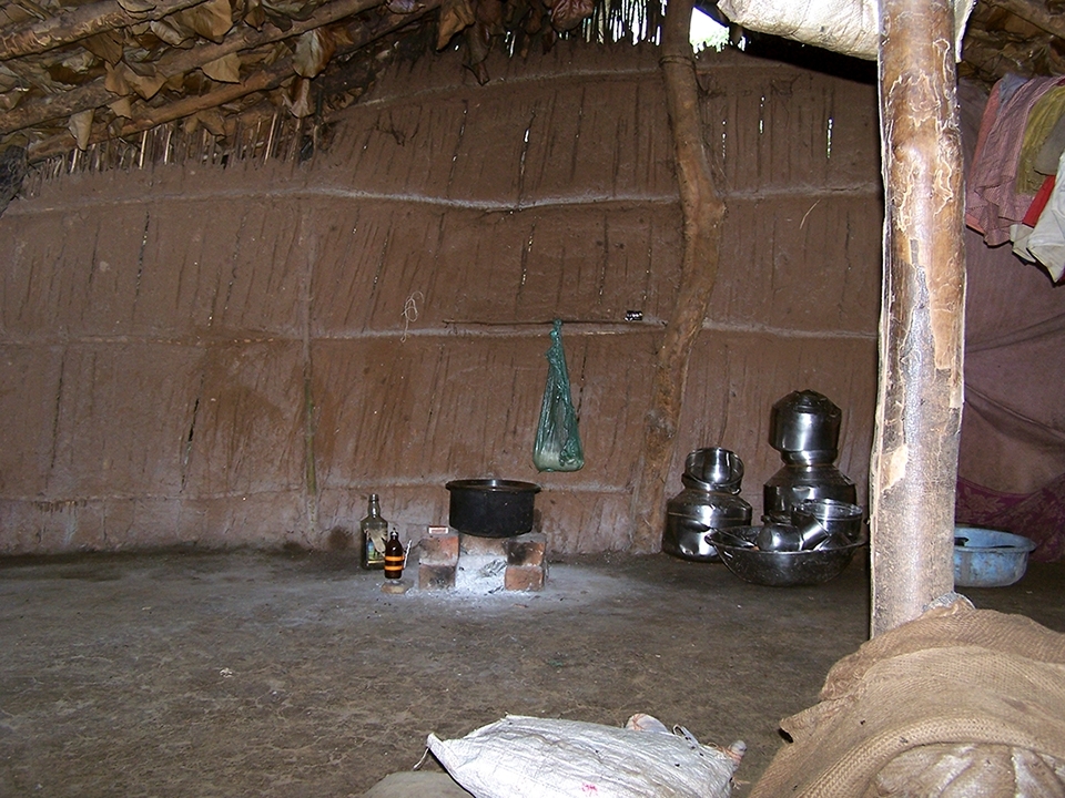 All-In-One, Bedroom, Hall, Study and Kitchen. Stove made of few bricks, Kerosene in bottle, makeshift lamp and one Kg of rice in plastic bag for the Family of four.